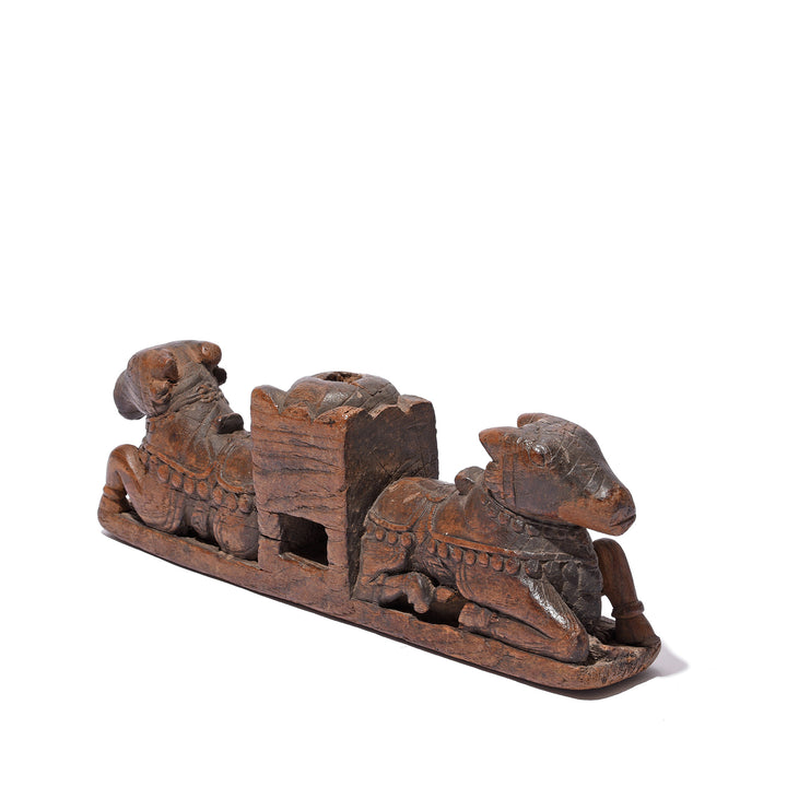 Angled View Of Antique Carved Teak Nandi Cradle Finial From Andra Pradesh - 19th Century | Indigo Antiques