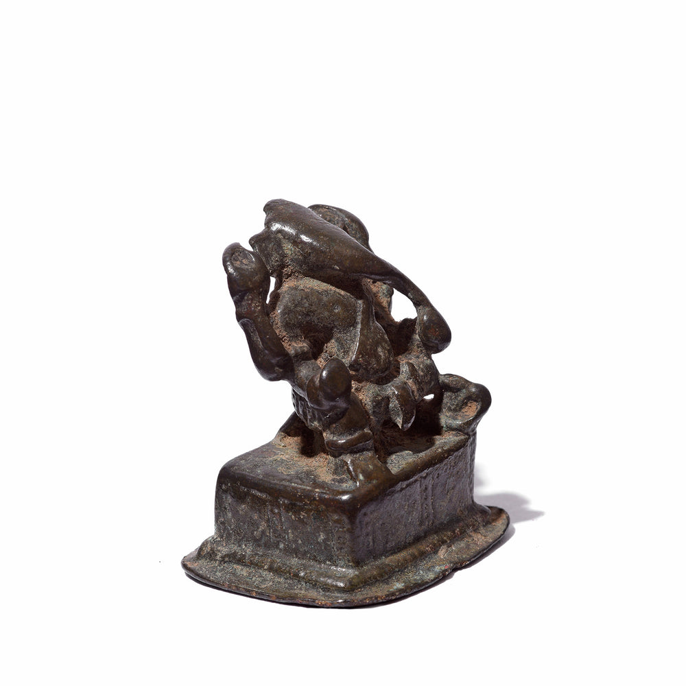 Angled View Of Antique Brass Miniature Votive Statue Of Lord Ganesh - 18th Century | Indigo Antiques