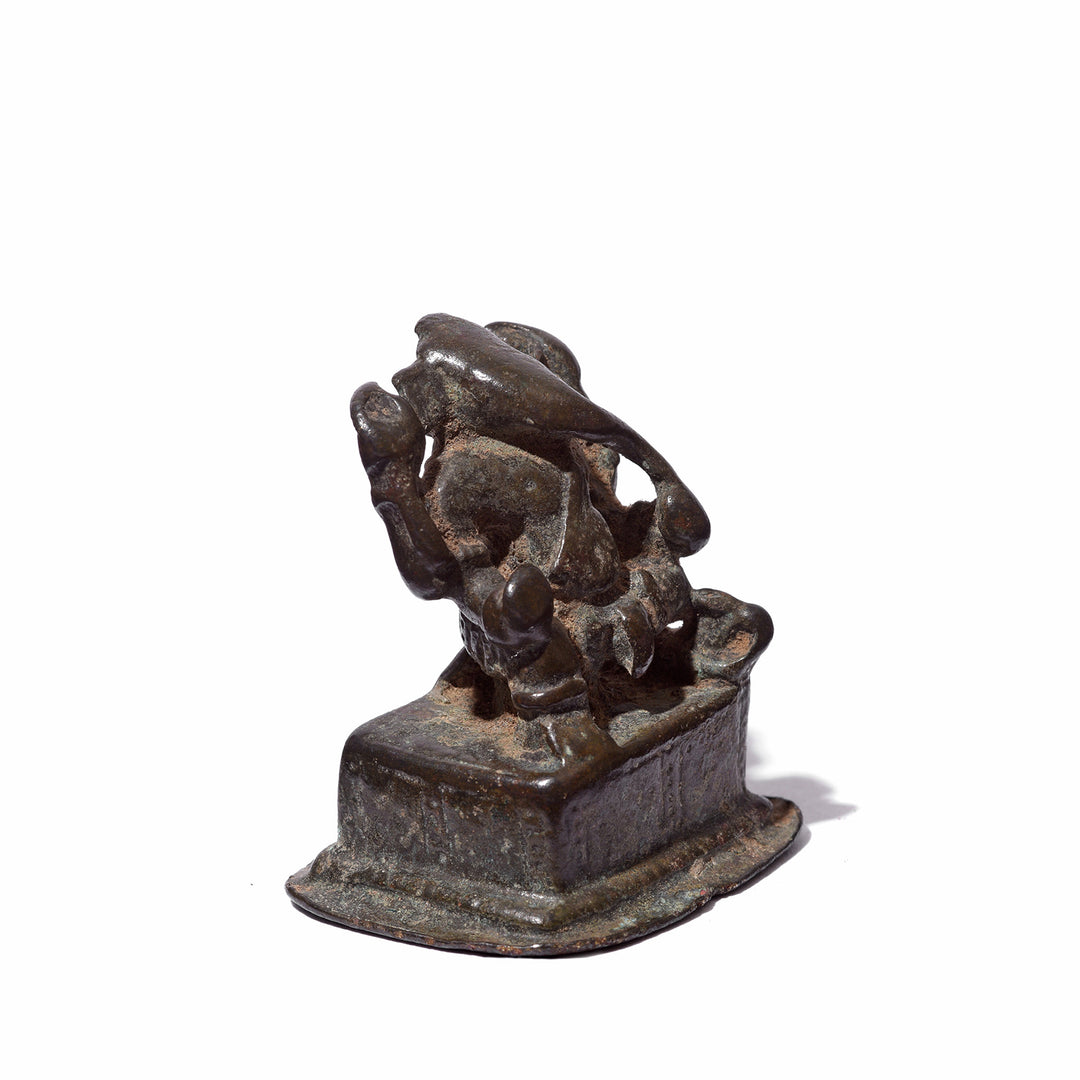 Angled View Of Antique Brass Miniature Votive Statue Of Lord Ganesh - 18th Century | Indigo Antiques