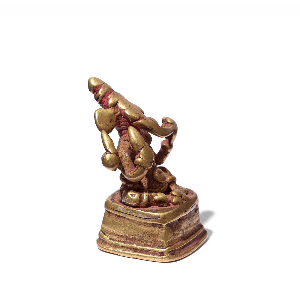 Angled View Of Atique Brass Miniature Votive Statue Of Lord Ganesh - 18th Century | Indigo Antiques