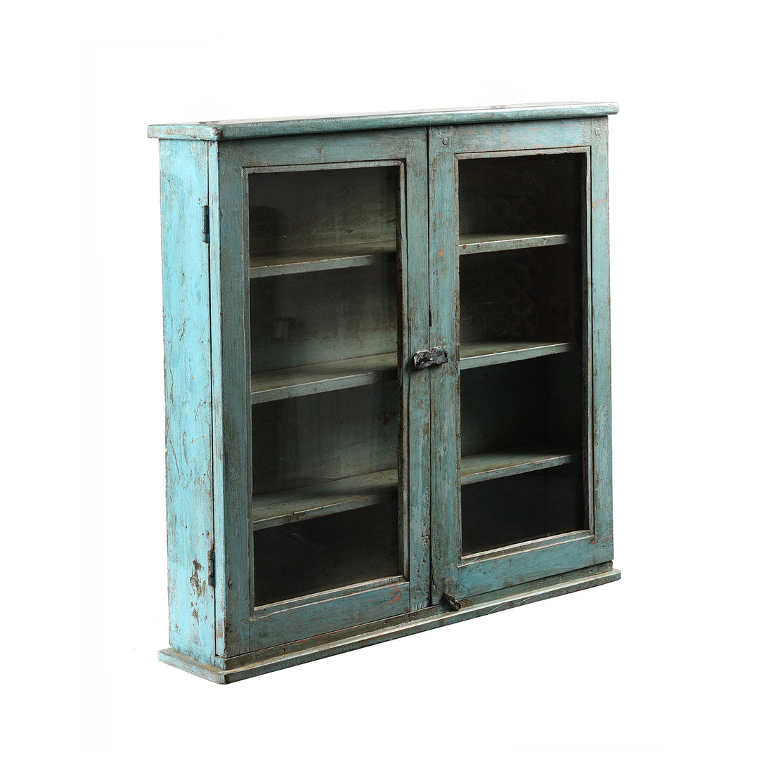 Angled View Of Painted Teak Glazed Wall Cabinet From India - Ca 1930 | Indigo Antiques