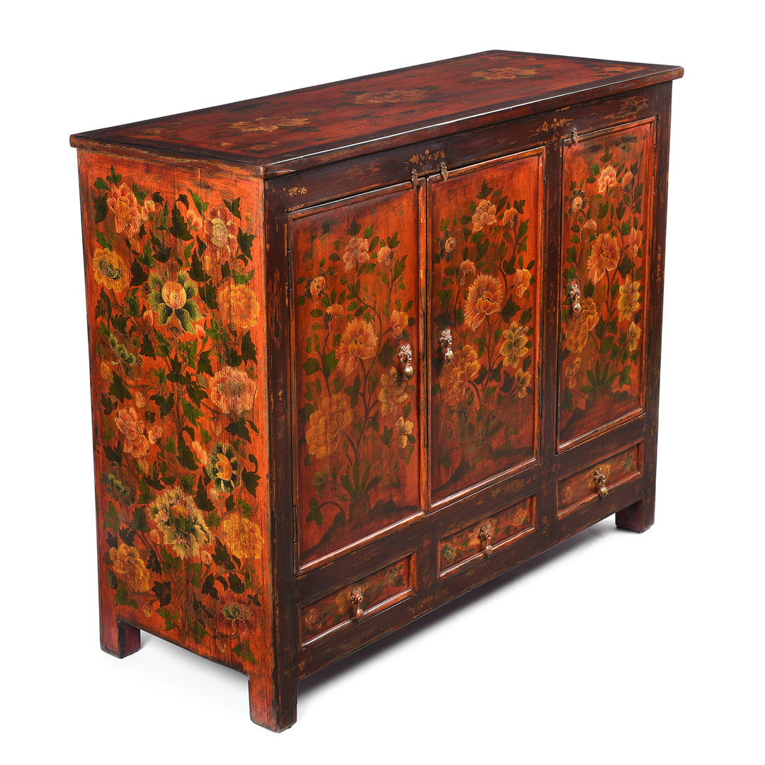 Angled View Of Painted Reproduction Tibetan Cabinet | Indigo Antiques