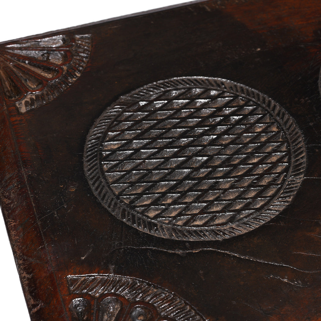 Stylised Indian Lotus Symbols on an antique teak Indian Puja Chowki | Indigo Antiques