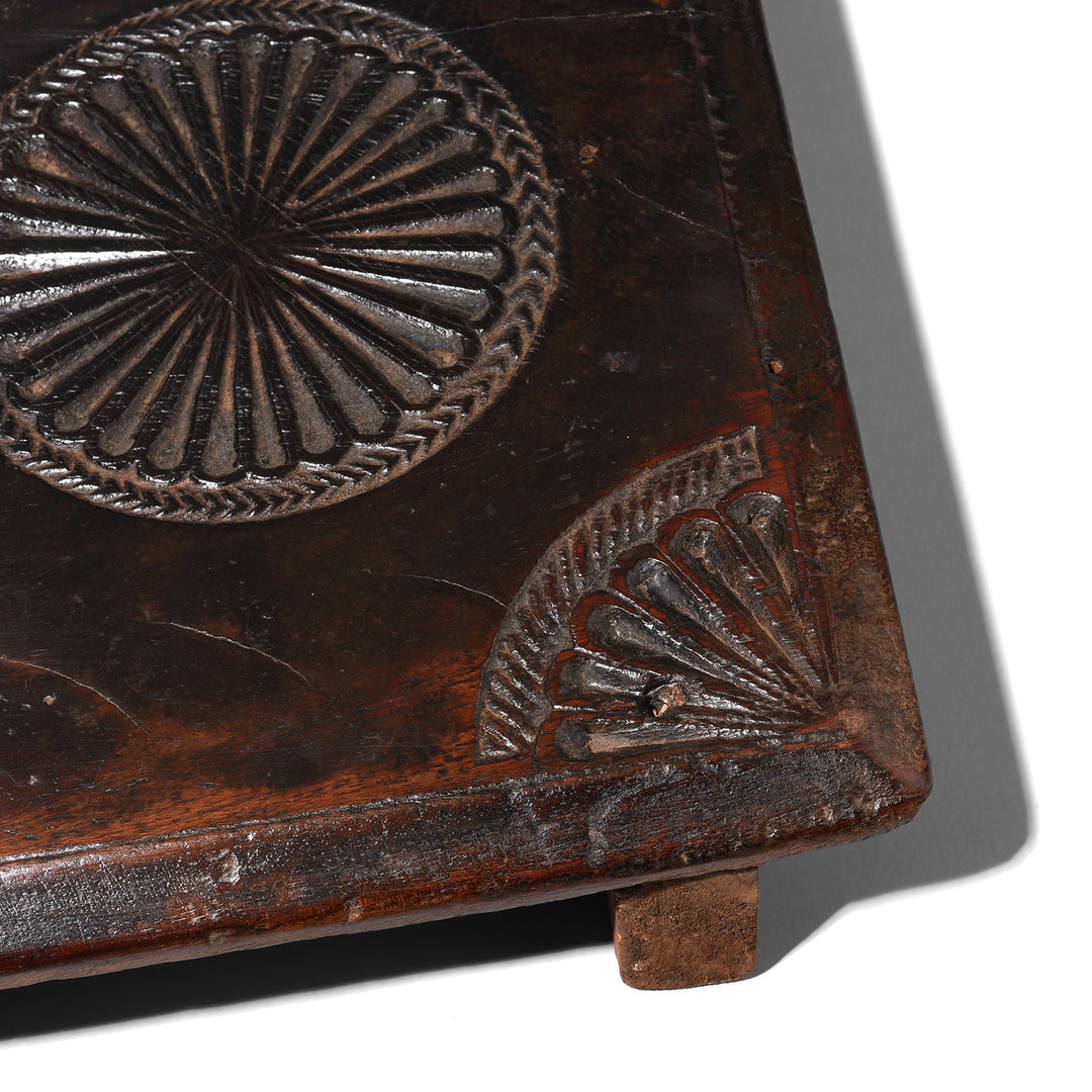 Stylised Indian Lotus Symbols on an antique teak Indian Puja Chowki | Indigo Antiques