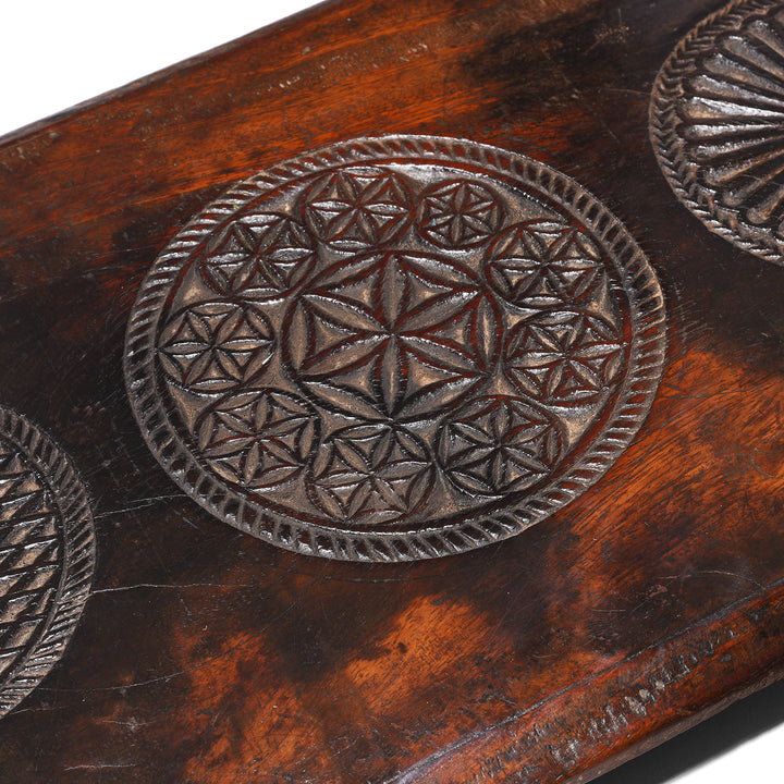 Stylised Indian Lotus Symbols on an antique teak Indian Puja Chowki | Indigo Antiques