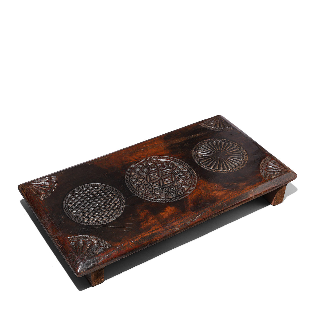 Antique Indian Chip Carved Puja Chowki (Pooja Chowki) From Kutch Made from Teak Wood And Incised with Lotus Symbols Indigo Antiques