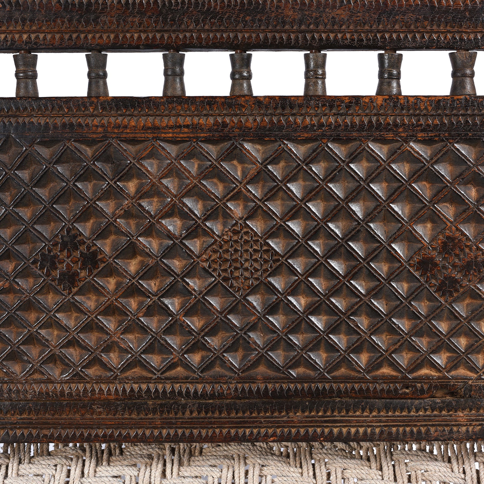 Carving Detail From Antique Chip Carved Low Pidha Chair From Rajasthan - 19th Century | INDIGO ANTIQUES