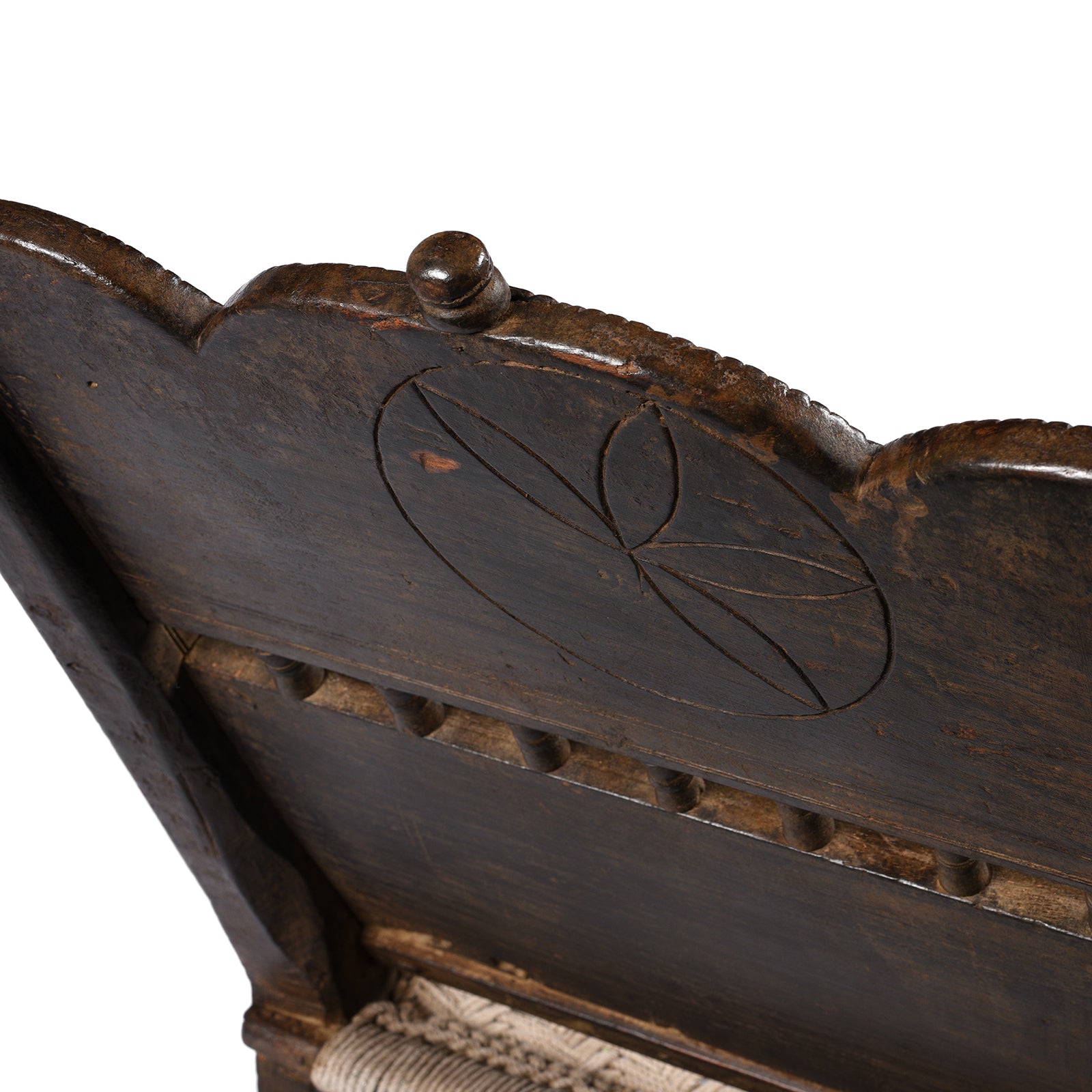 Carving Detail From Antique Chip Carved Low Pidha Chair From Rajasthan - 19th Century | INDIGO ANTIQUES