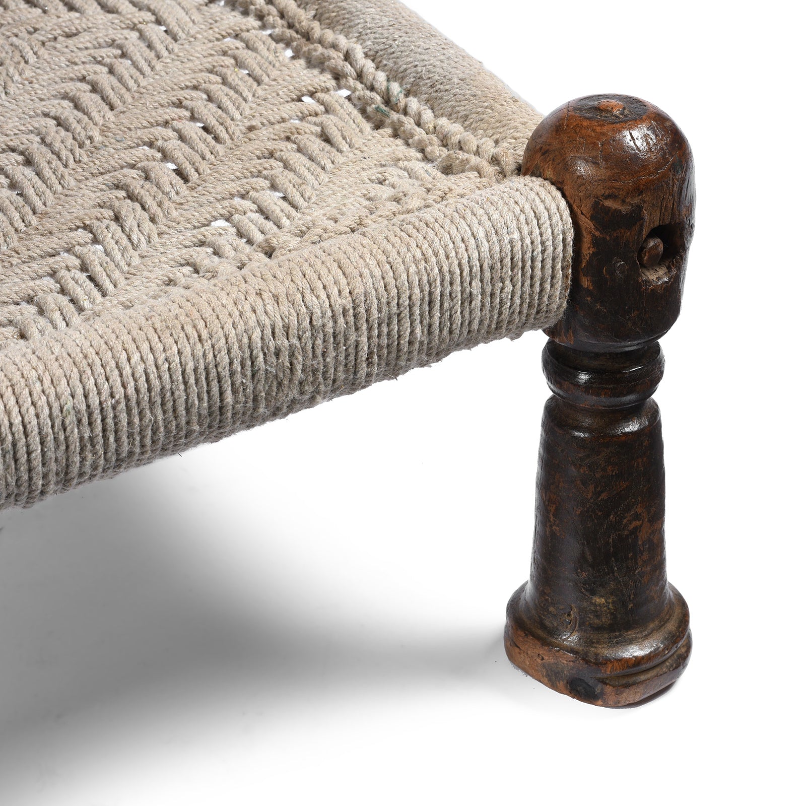 Leg Detail From Antique Chip Carved Low Pidha Chair From Rajasthan - 19th Century | INDIGO ANTIQUES