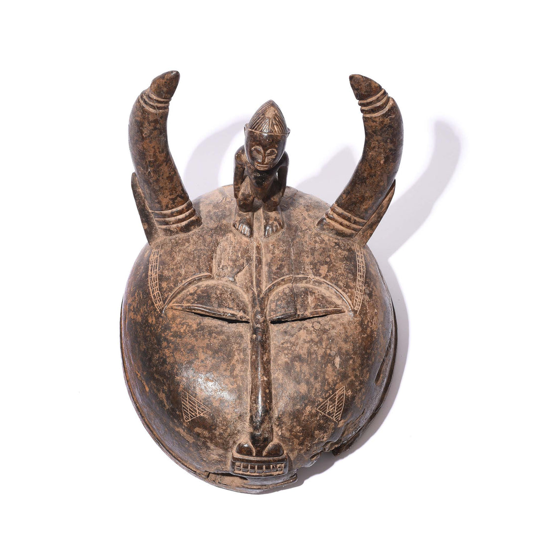 Frontal View Of Carved Senufo Helmet Mask - Ca 100 Yrs Old | Indigo Antiques