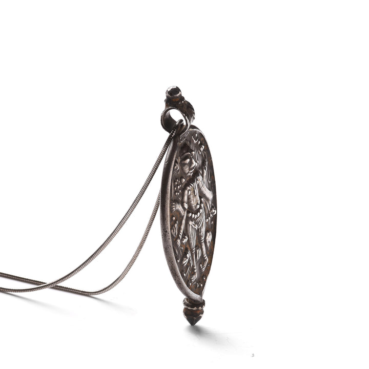 Angled View Of Old Tribal Silver Amulet - from Rajasthan - 19thC | Indigo Antiques