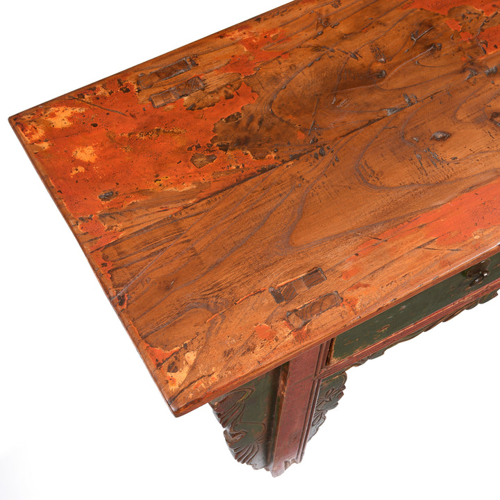 Top detail of worn lacquer on an antique Mongolian kang cabinet | Indigo Antiques