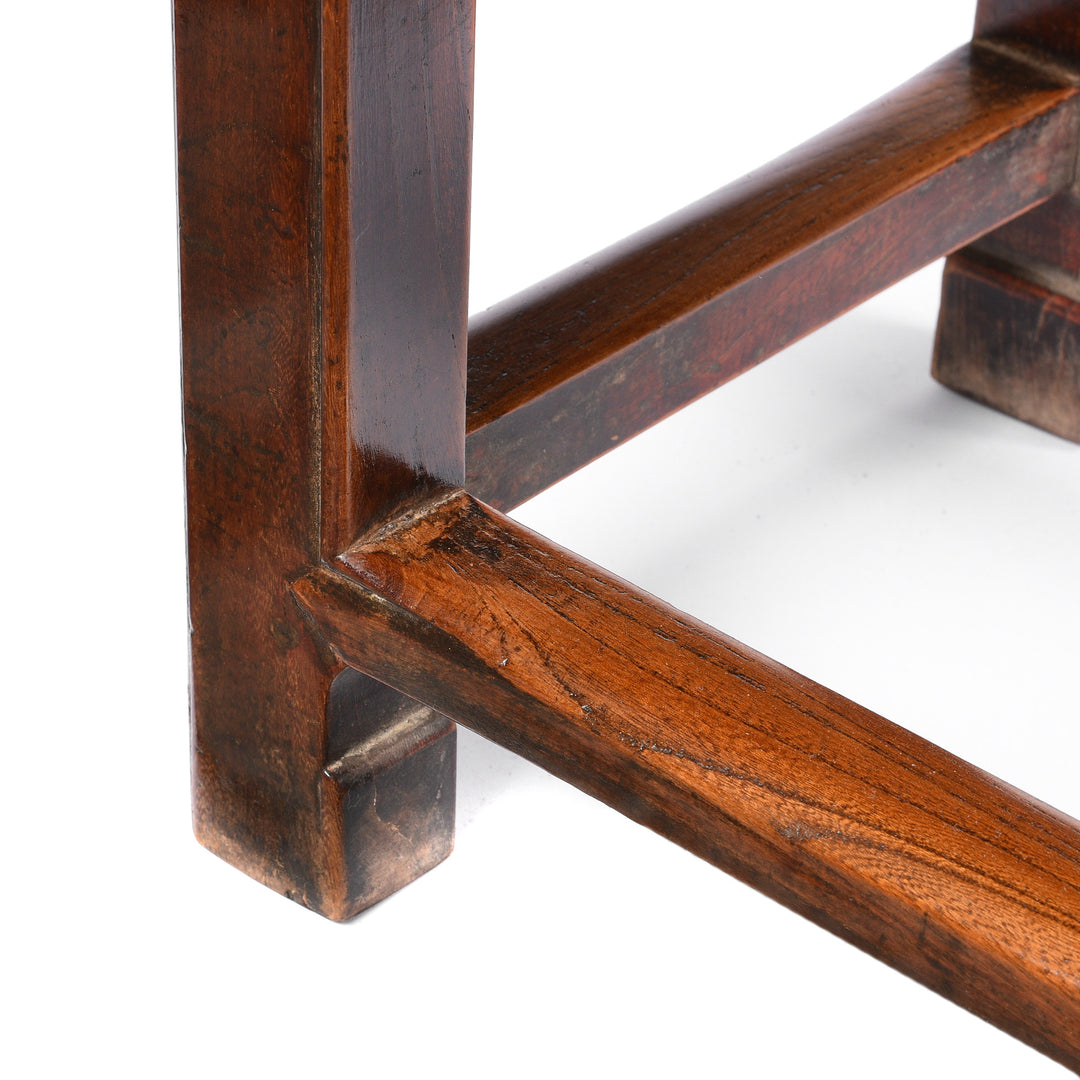 Foot detail of a Burgundy Lacquer Antique Chinese Stool | Indigo Antiques