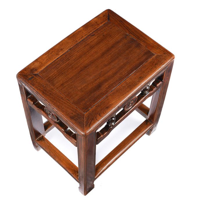 Top Detail of a red elm Burgundy Lacquer Antique Chinese Stool | Indigo Antiques