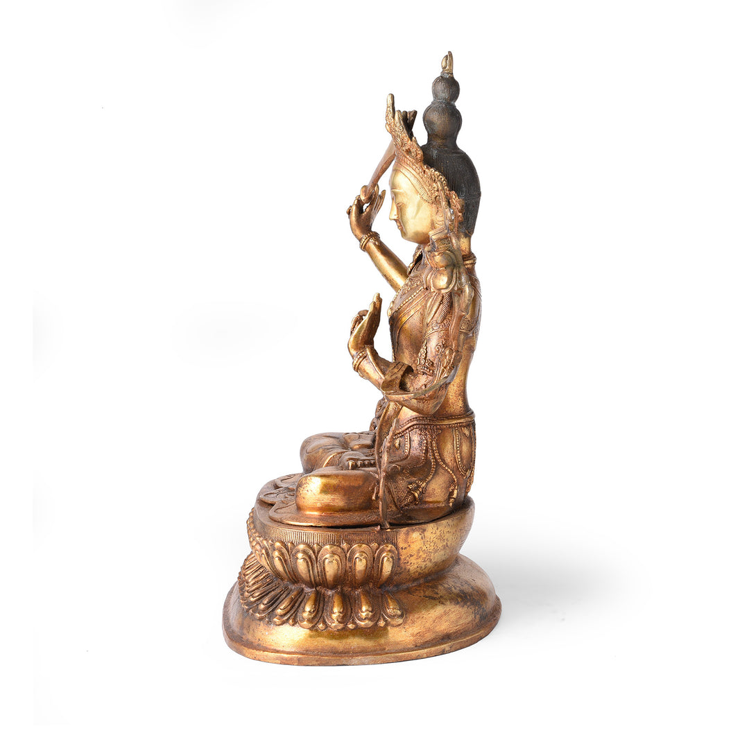 Side View Gilded Brass Statue Of Tibetan Manjushri With his Sword Held High On a Lotus Throne| Indigo Antiques