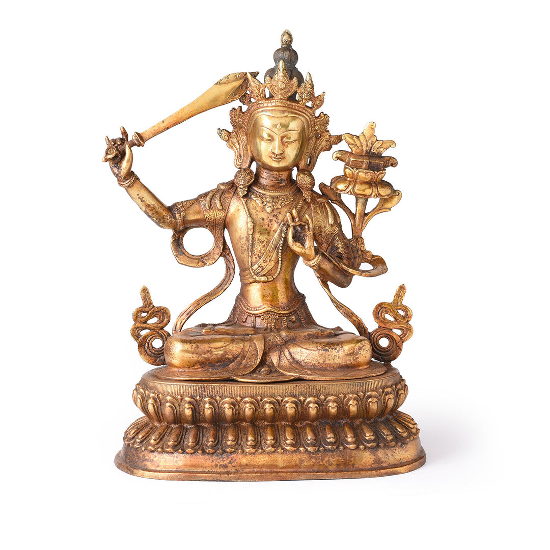 Gilded Brass Statue Of Tibetan Manjushri With his Sword Held High On a Lotus Throne| Indigo Antiques