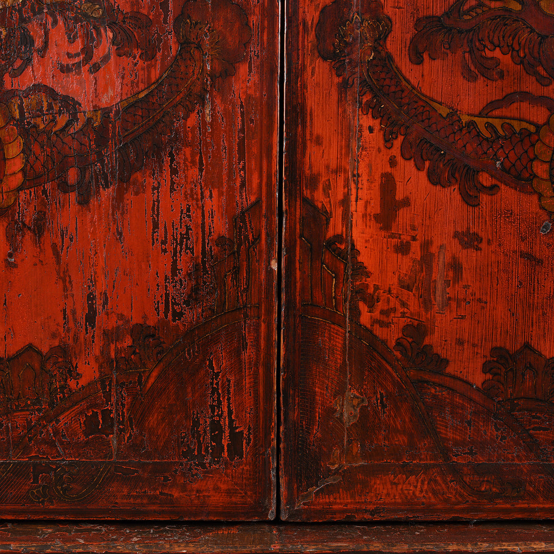 Central Detail of an Antique Gilt Chinese Red Lacquer Chilong Dragon Wedding Cabinet | Indigo Antiques