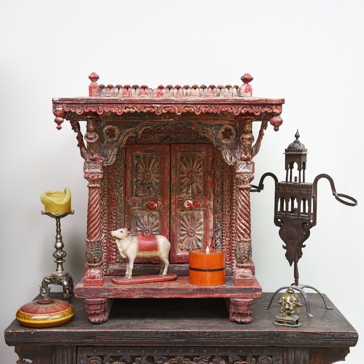 Antique Indian house shrine with other Indian decorative antiques including an antique lacquered tobacco pot from Rajasthan | Indigo Antiques