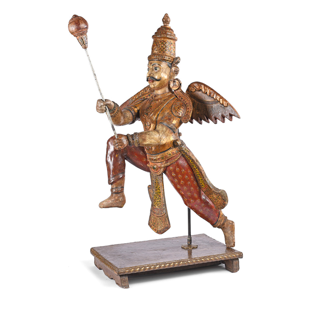 Angled View Of Painted South Indian Figure of Garuda - Late 19thC | Indigo Antiques
