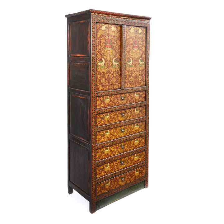 Angled View Of Painted Reproduction Tall Tibetan Cabinet | Indigo Antiques