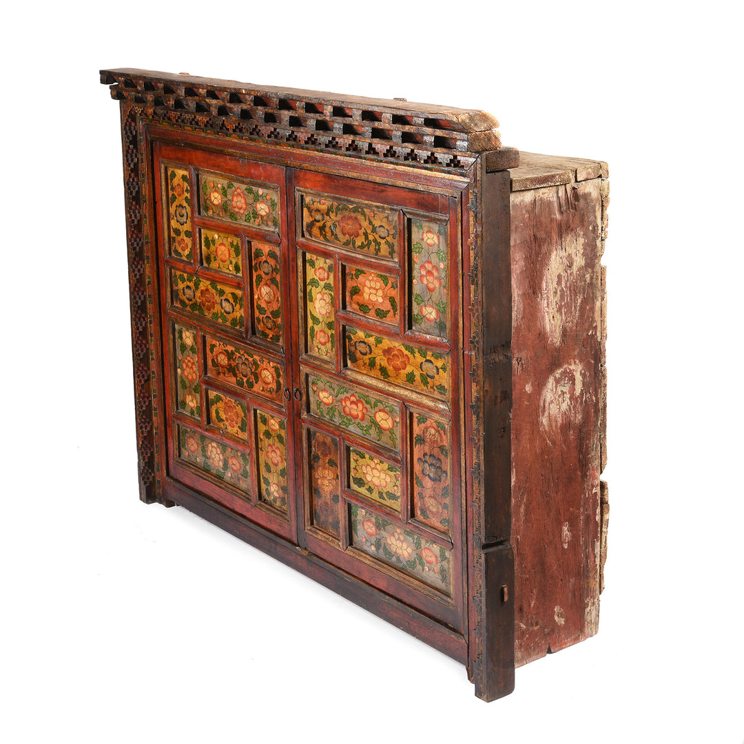 Angled VIew Of Painted Tibetan Chosham Shrine Cabinet - Early 19thC | Indigo Antiques