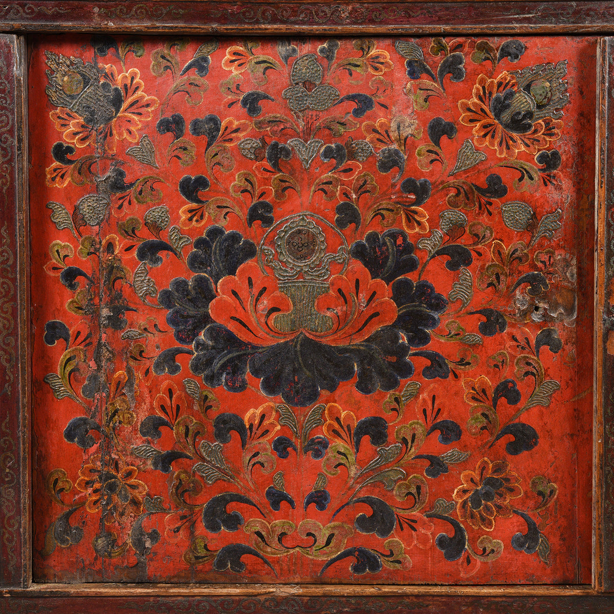 Painting detail of a lotus and other Tibetan symbols on an Antique Painted Altar Cabinet from Tibet - 19thC | Indigo Antiques