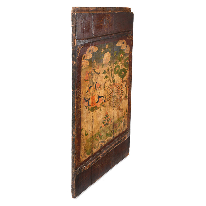 Angled View Of Tibetan Painted Panel of Güsh Khaan With Tiger - 18thC | Indigo Antiques