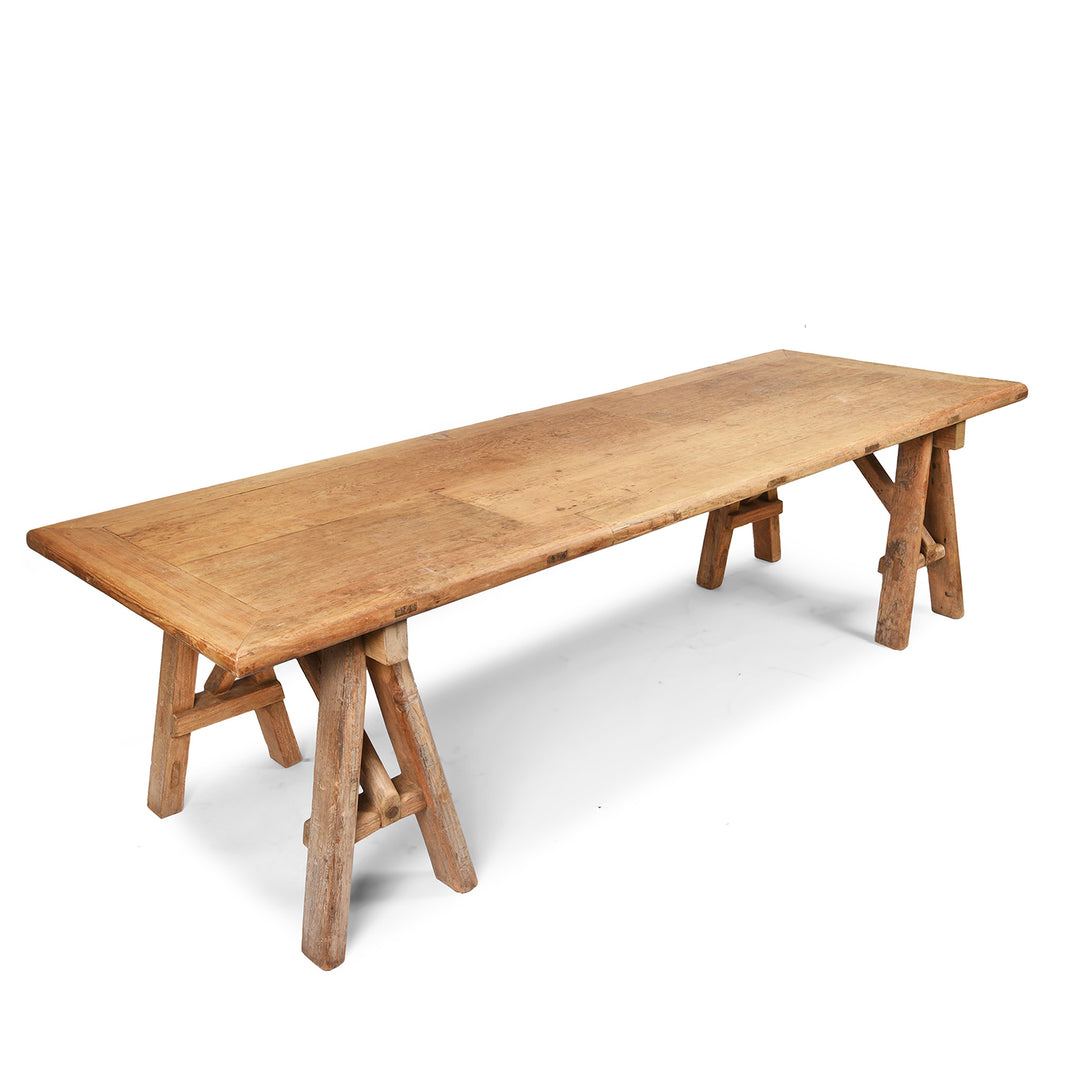 Angled VIew Of Trestle Dining Table Made From Old Elm | Indigo Antiques