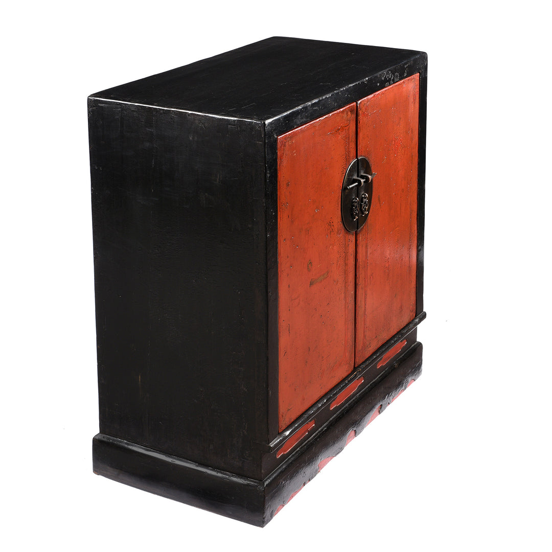 Angled View Of Antique Red & Black Lacquer Book Cabinet From Shanxi Province - 19th Century | Indigo Antiques