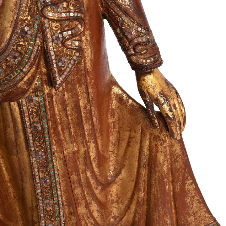 Hand detail of an Antique Gilded Teak Standing Mandalay Buddha - Late 19th century | Indigo Antiques