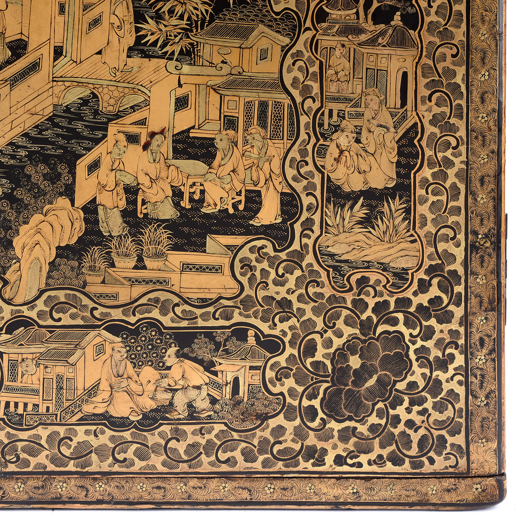 Corner detail from a Gilt black lacquer Chinese export chinoiserie table cabinet. Antique & made in Canton. Similar to examples found in the Peabody Essex Museum. Exceptional quality | Indigo Antiques