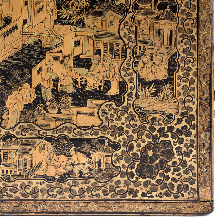 Corner detail from a Gilt black lacquer Chinese export chinoiserie table cabinet. Antique & made in Canton. Similar to examples found in the Peabody Essex Museum. Exceptional quality | Indigo Antiques