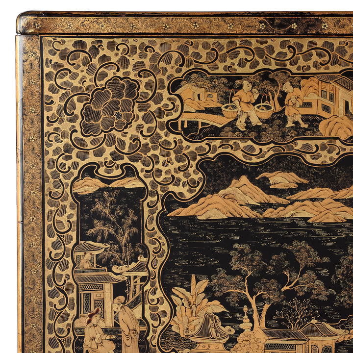 Corner detail from a Gilt black lacquer Chinese export chinoiserie table cabinet. Antique & made in Canton. Similar to examples found in the Peabody Essex Museum. Exceptional quality | Indigo Antiques