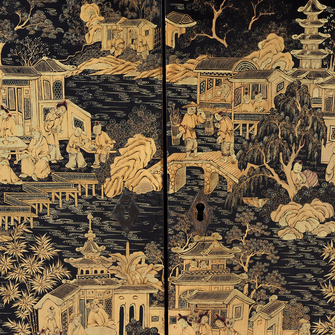 Front detail from a Gilt black lacquer Chinese export chinoiserie table cabinet. Antique & made in Canton. Similar to examples found in the Peabody Essex Museum. Exceptional quality | Indigo Antiques