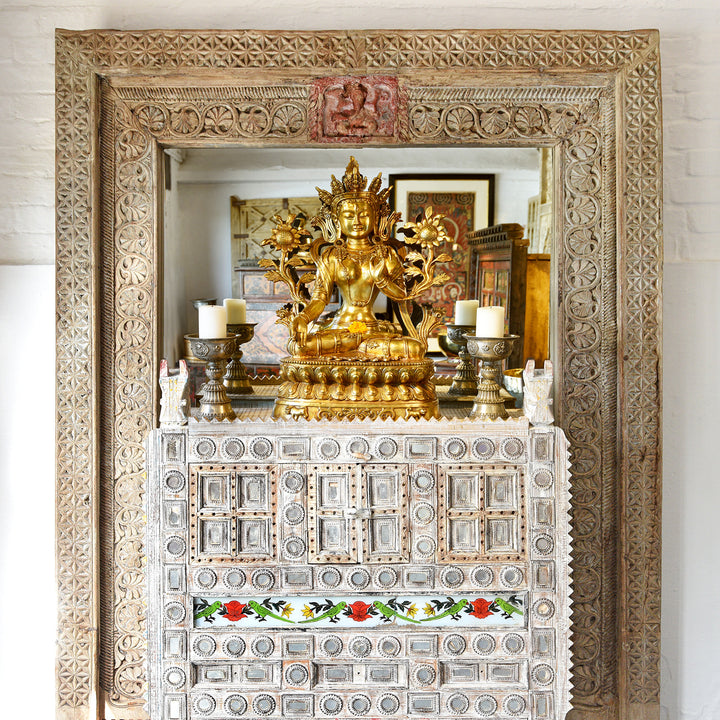 Reproduction Bronze Tara Displayed With a Kutchi Door & Damchiya | Indigo Antiques