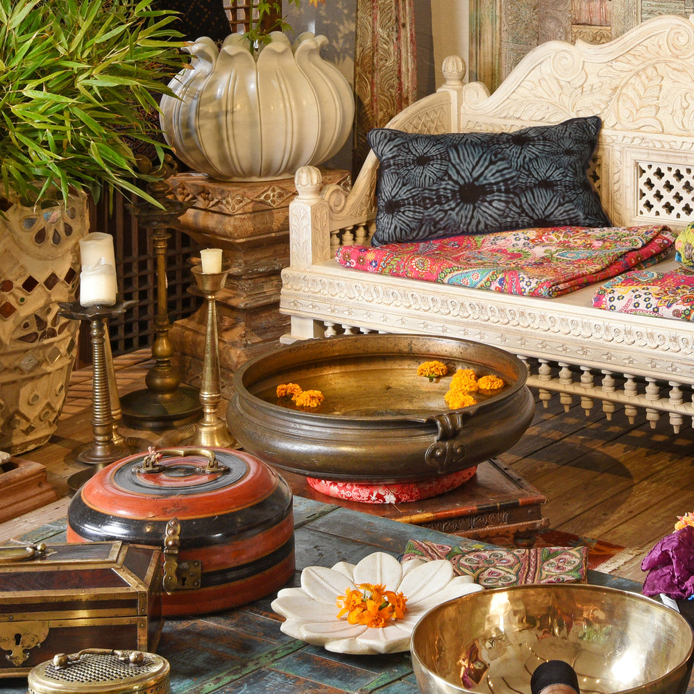 Indian antique urli cauldron from South Indian in an Indian shrine | Indigo Antiques