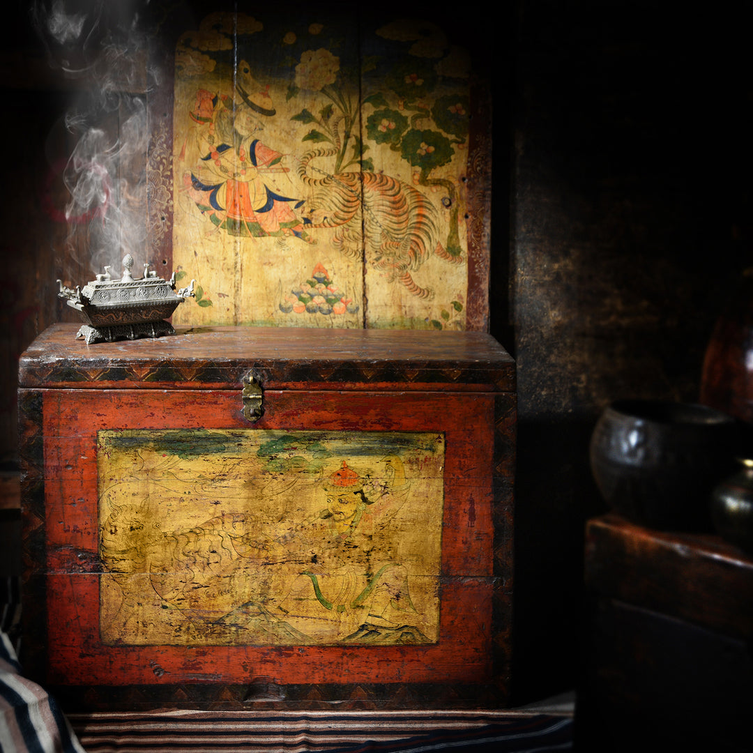 An antique Tibetan set of panel & Tibetan trunk depicting Mongolian Khan Güsh Khaan With Tiger