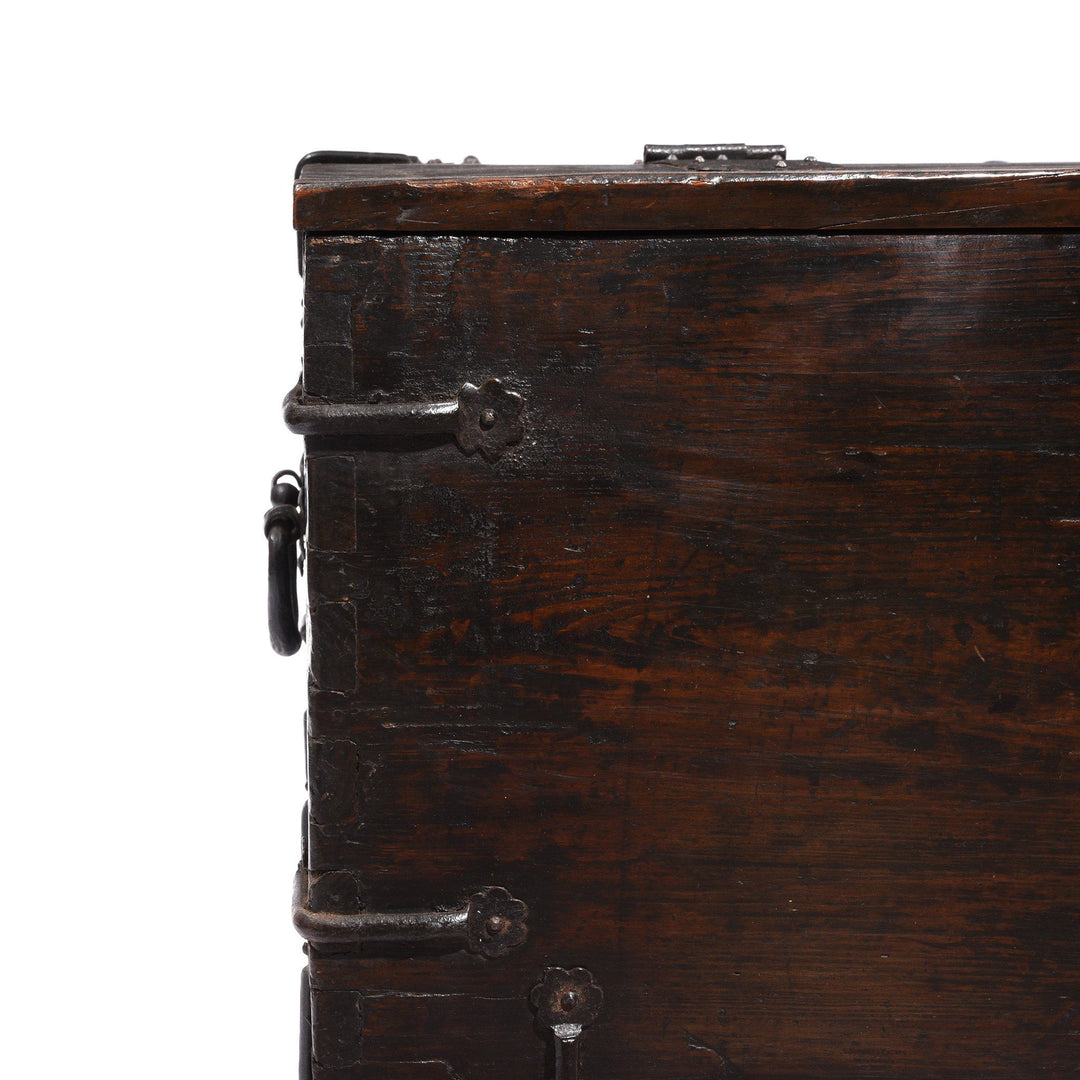 Corner detail from an Antique Korean Wooden Coin Chest With Iron Hardware | Indigo Antiques