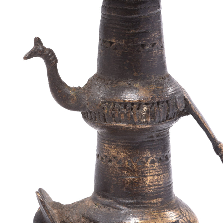 Peacock Detail of an Antique Indian Brass Dhokra Work Oil Lamp With Elephant & Peacock From Chhattisgarh - Ca 1910 | Indigo AntiquesAntique Indian Brass Dhokra Work Oil Lamp With Elephant & Peacock From Chhattisgarh - Ca 1910 | Indigo Antiques