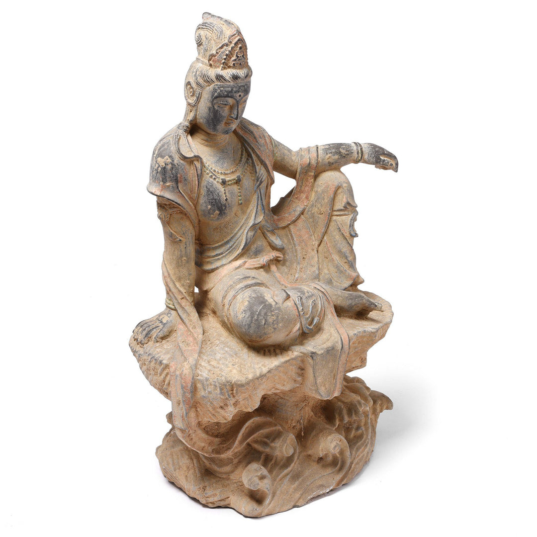 Angle View Of Carved Stone Seated Guanyin Statue | Indigo Antiques