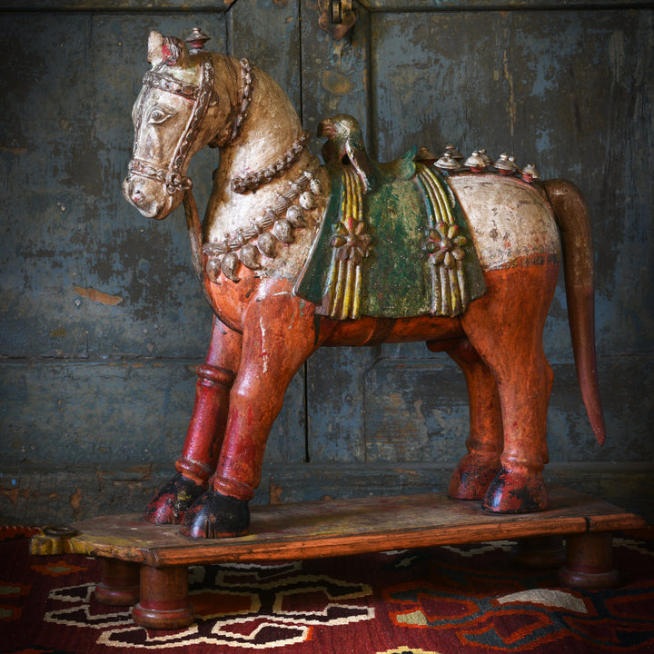 A rare painted teak horse from Patan, India carved in the 19th century. 