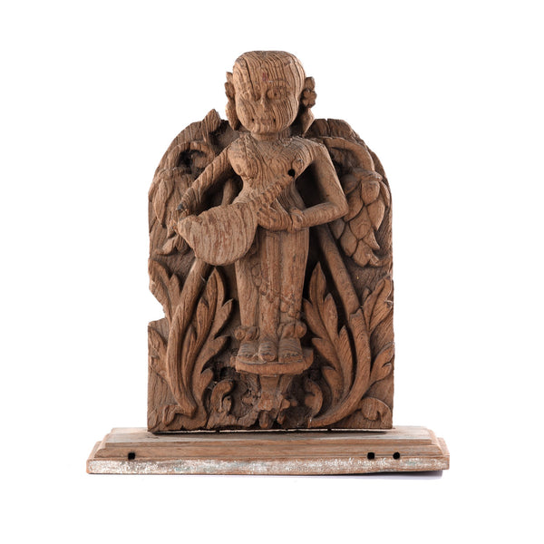Teakwood Carving of a Musician From Gujarat - 18thC