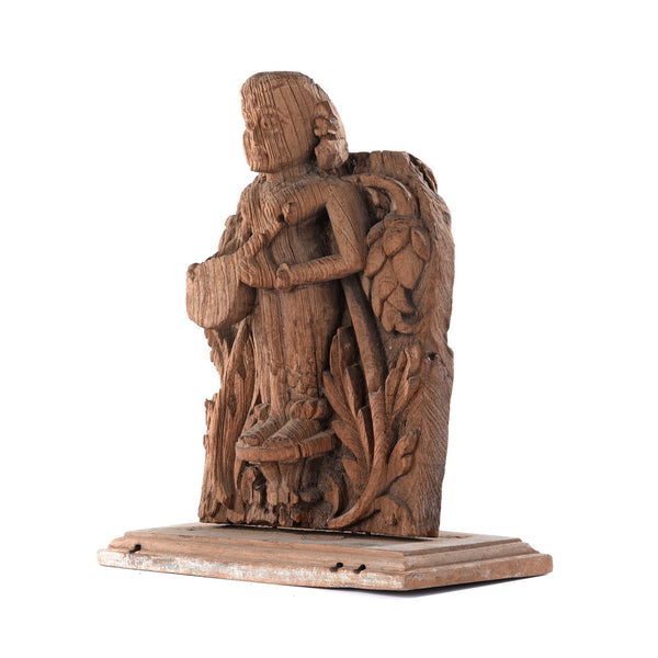Teakwood Carving of a Musician From Gujarat - 18thC