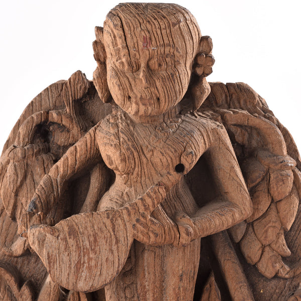 Teakwood Carving of a Musician From Gujarat - 18thC