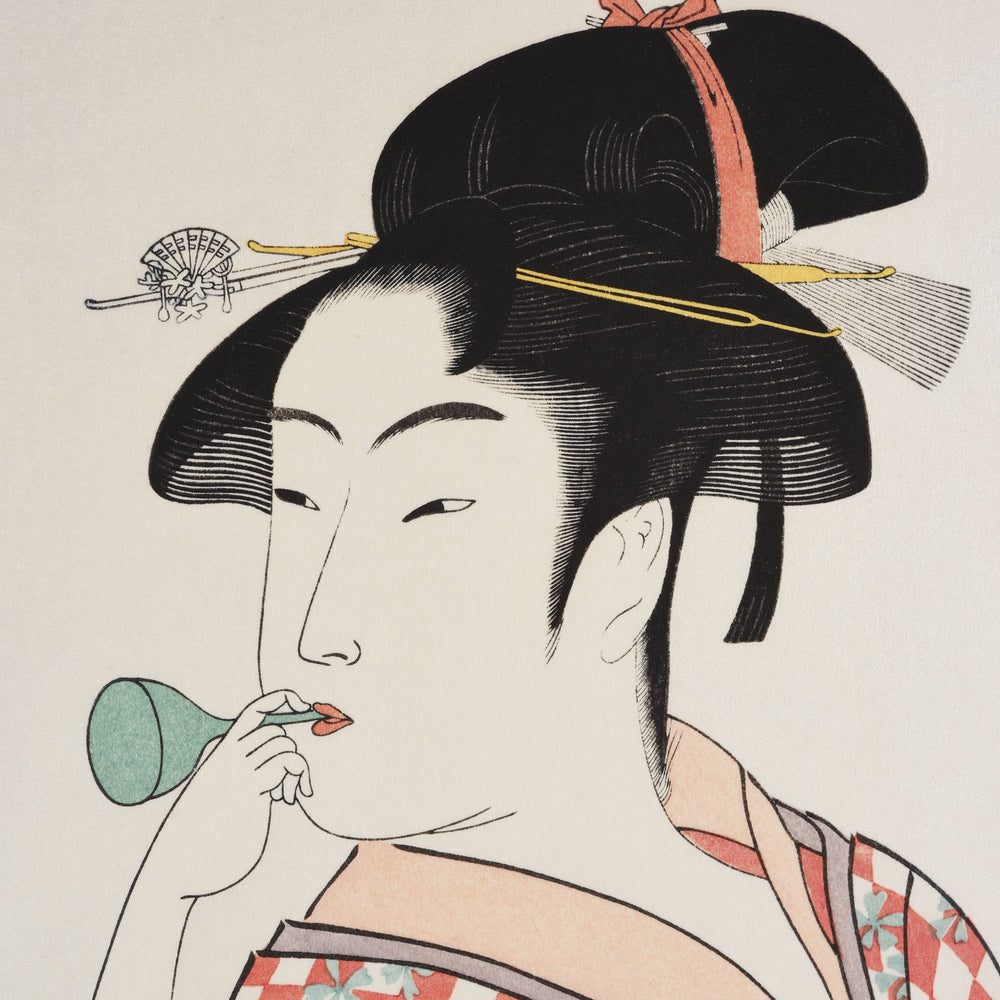 Vintage "Young Woman Blowing a Poppin" Framed Japanese Woodblock Print by Utamaro | Indigo Oriental Antiques