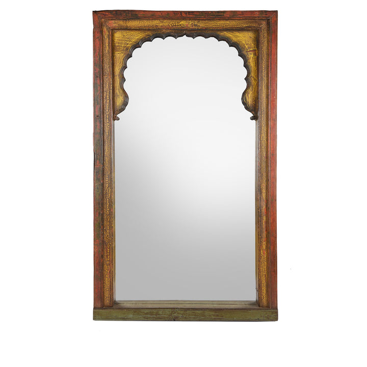 Red, yellow & green painted Indian mirror made from a vintage reclaimed mihrab window frame from Rajasthan dating from 19th century
