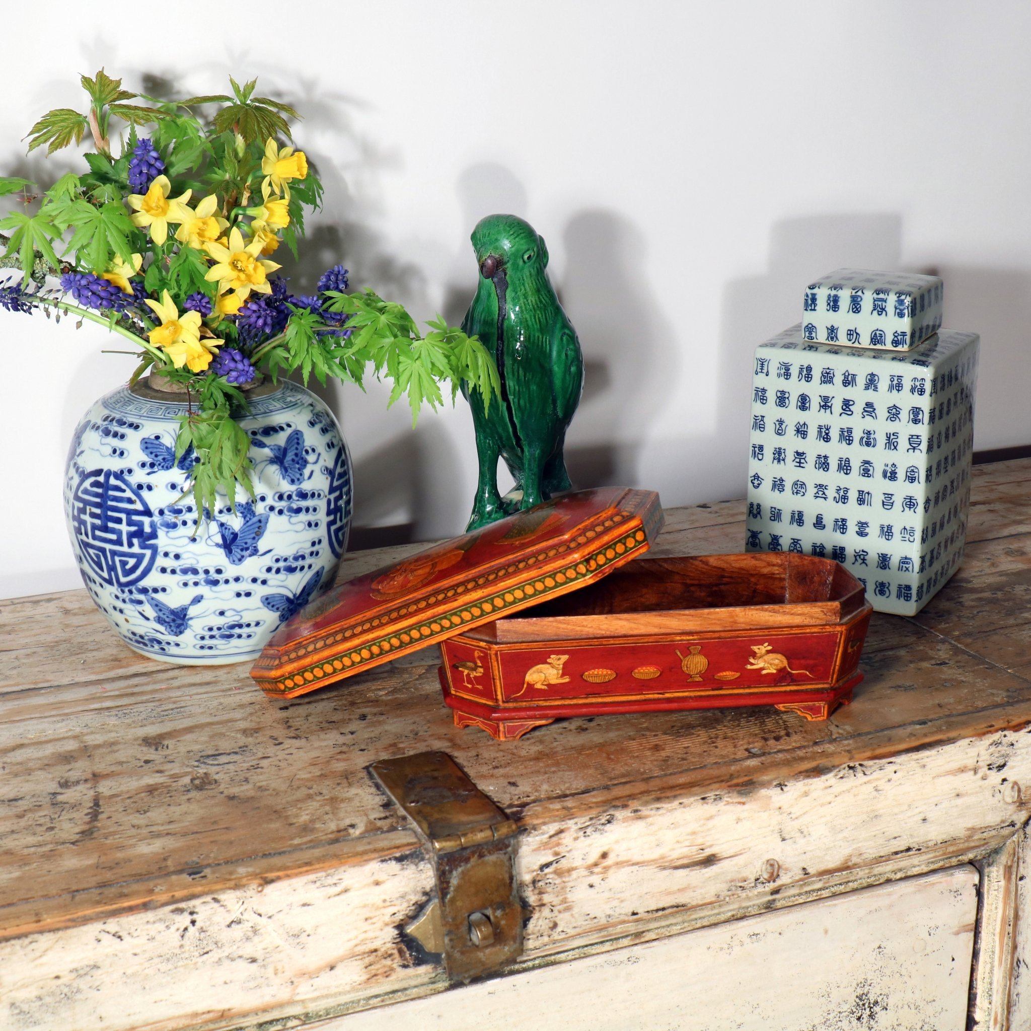Red painted Indian pen box with various oriental Chinese porcelain and ginger jars.