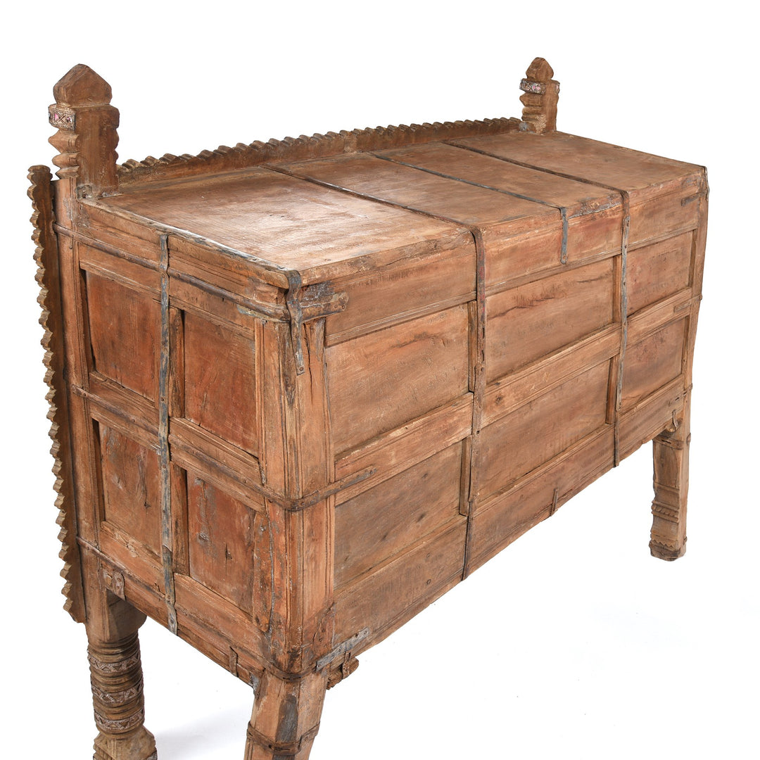 Detail from a carved Indian damchiya chests from The Rann of Kutch are classic examples of the furniture in the area. Their beautiful carving and mirror work is unique and they were used as dowry chests.