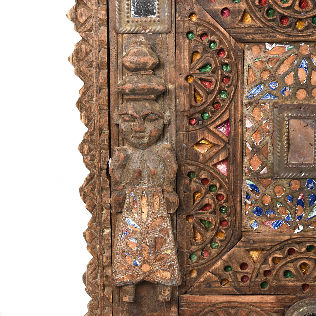 Detail from a carved Indian damchiya chests from The Rann of Kutch are classic examples of the furniture in the area. Their beautiful carving and mirror work is unique and they were used as dowry chests.
