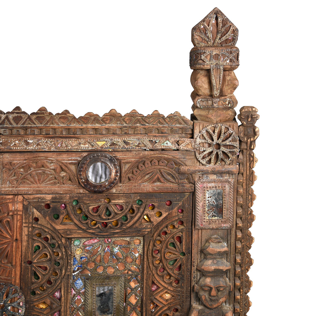 Detail from a carved Indian damchiya chests from The Rann of Kutch are classic examples of the furniture in the area. Their beautiful carving and mirror work is unique and they were used as dowry chests.